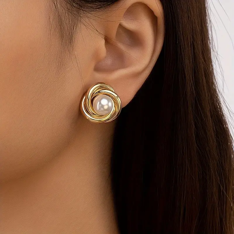 Boucles d'oreilles en or élégantes avec perles