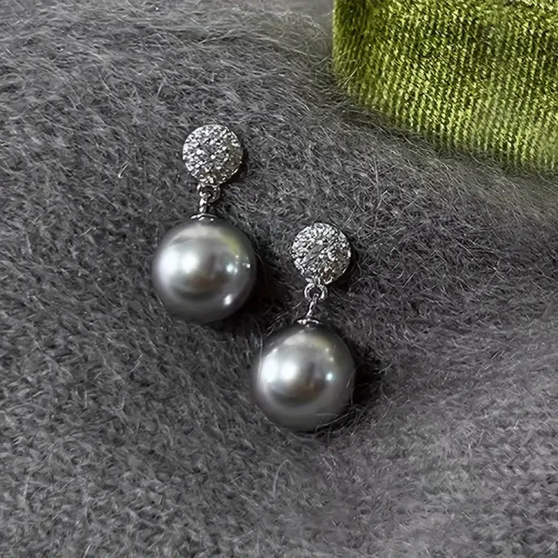 Boucles d'oreilles en perles noires élégantes avec des strass
