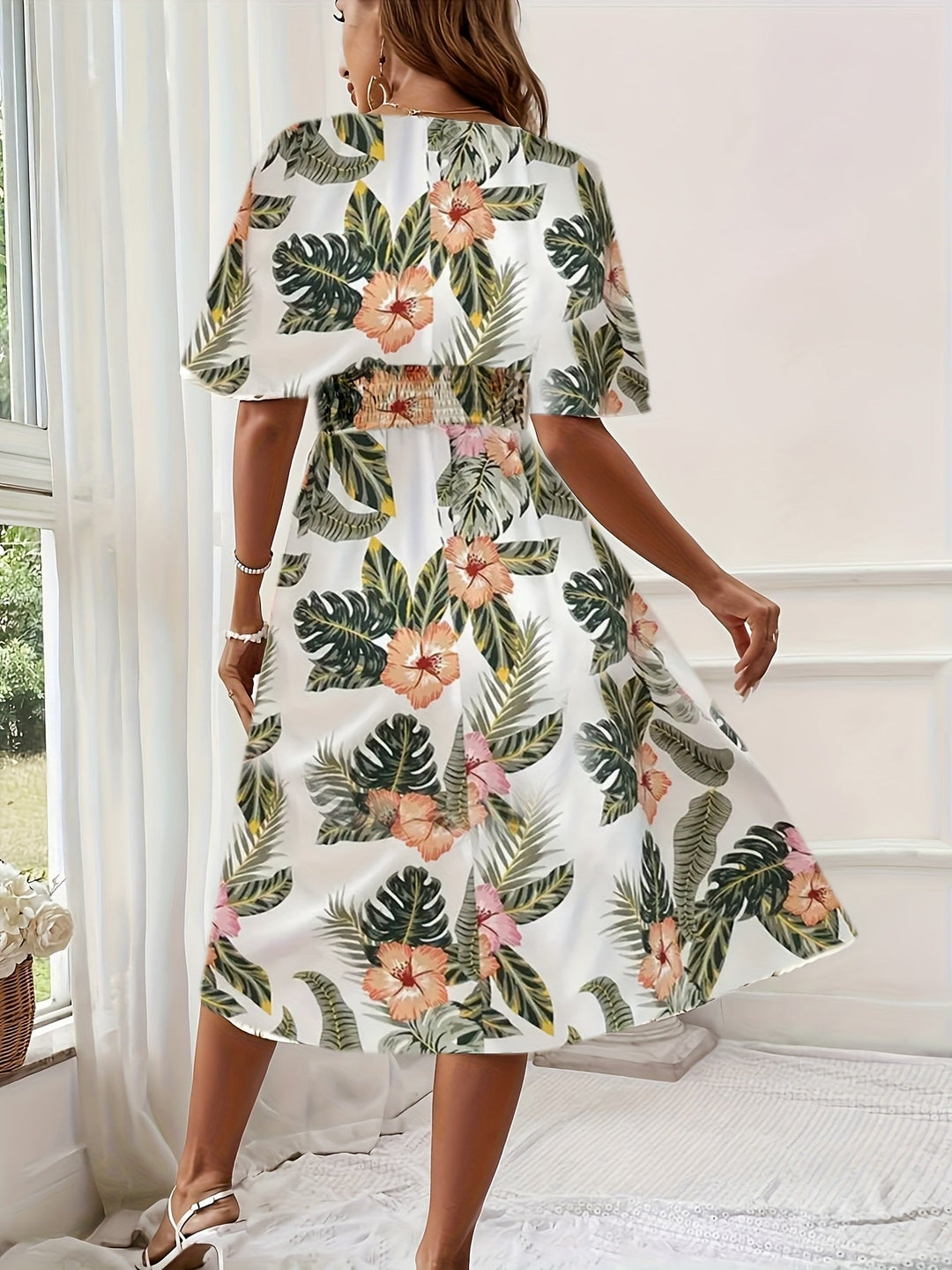 Lily – Robe sans manches à imprimé floral